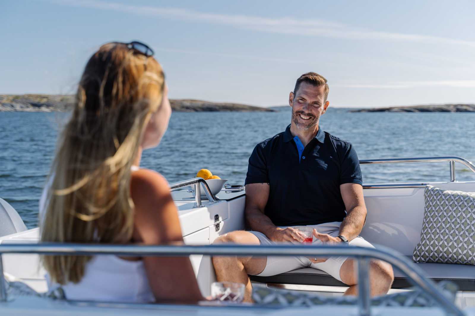 couple on Mery Fisher 695 Sport S2