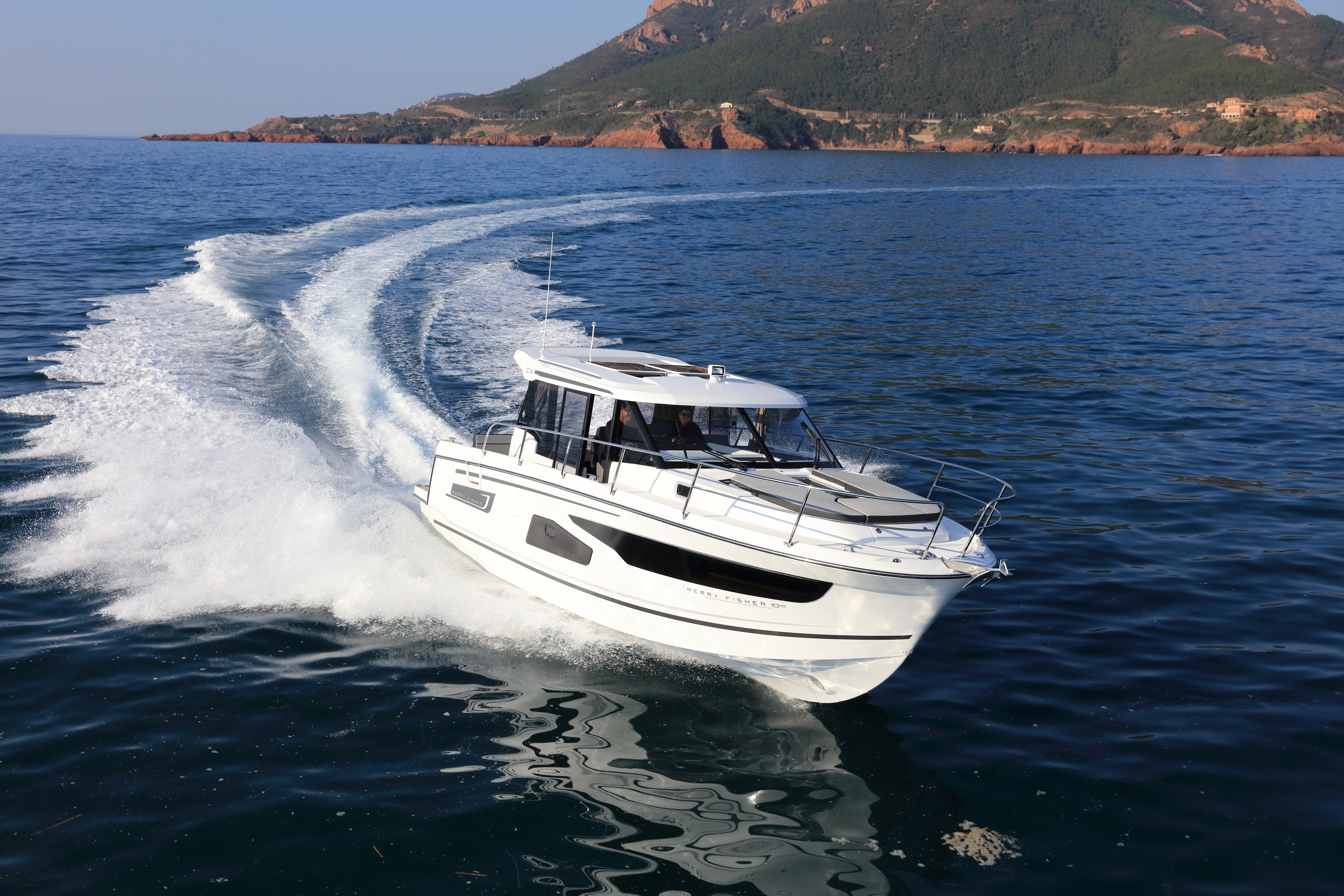 Jeanneau boat drifting on the sea